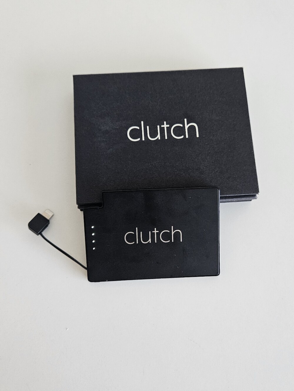 Clutch Thin Portable Charger Attached Charge Cable Lightning UCLA Surgery Phone